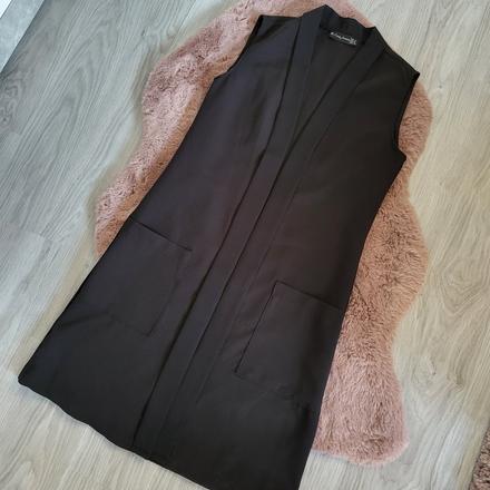 S elegantna vesta, s