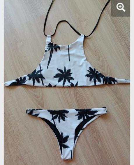 Biele plavky s čiernymi palmami, l