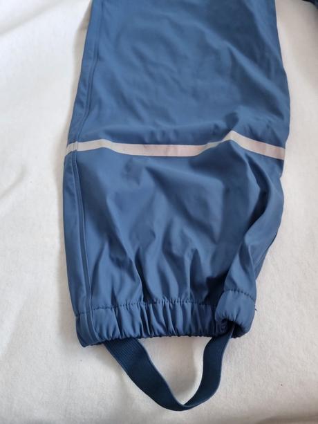 Nohavice do dažďa, lupilu,122