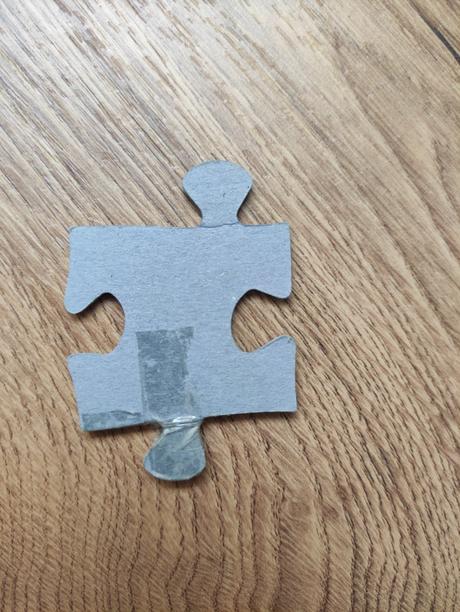 Puzzle dinosaury s plagatom,