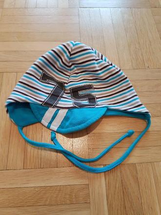 Prechodná čiapka, 74