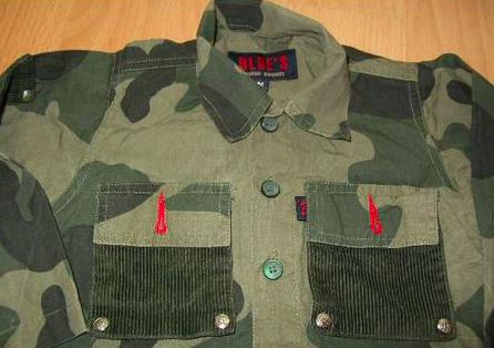 Maskáčová košela, 86