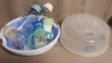 Sterilizator avent so sklenenymi flasami, avent