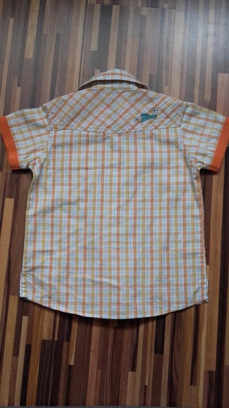 Kockovaná košeľa, 92