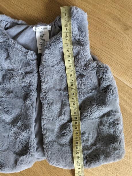 Kožušinová vesta, 92