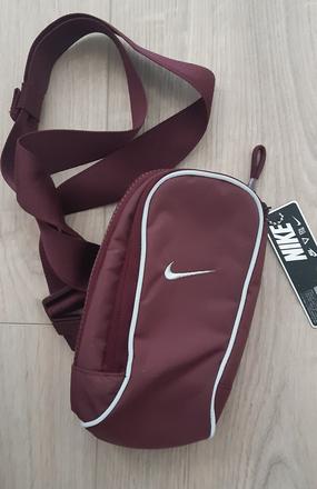Taštička nike, nike