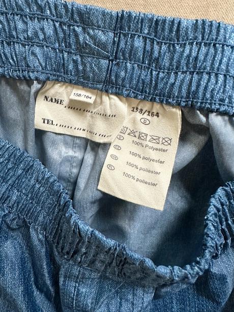 Nepremokavé nohavice, 158