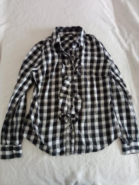 Kockovaná košeľa, 146