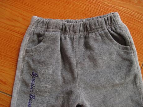 Šedé tepláčiky, 86