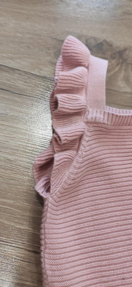 Dojčenský overal, 86