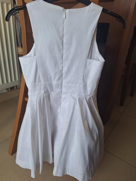 Nadherne znackove saty, 116