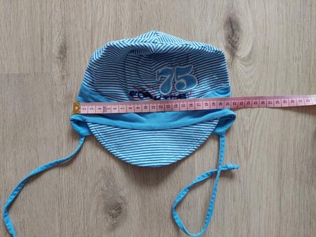 Prechodna ciapka so šiltom, 86