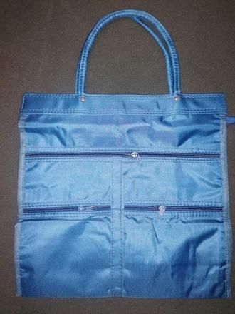 Pevná taška s vreckami,