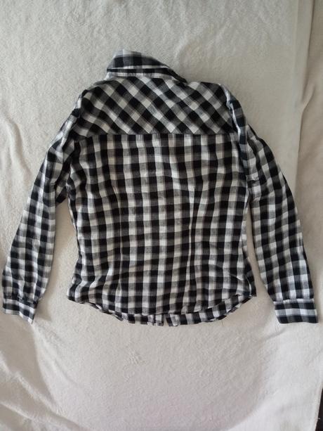 Kockovaná košeľa, 146