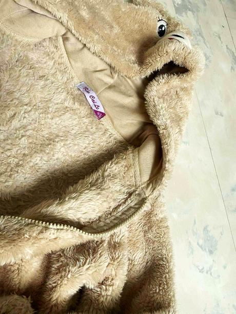 Teplá huňatá bundička 146/152, 146