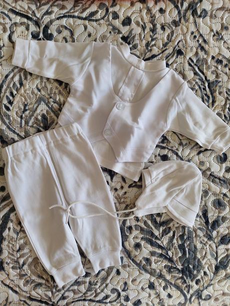 Oblečenie na krst, 56