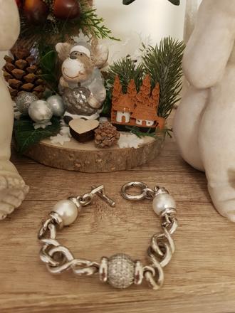 Ti sento strieborny naramok,