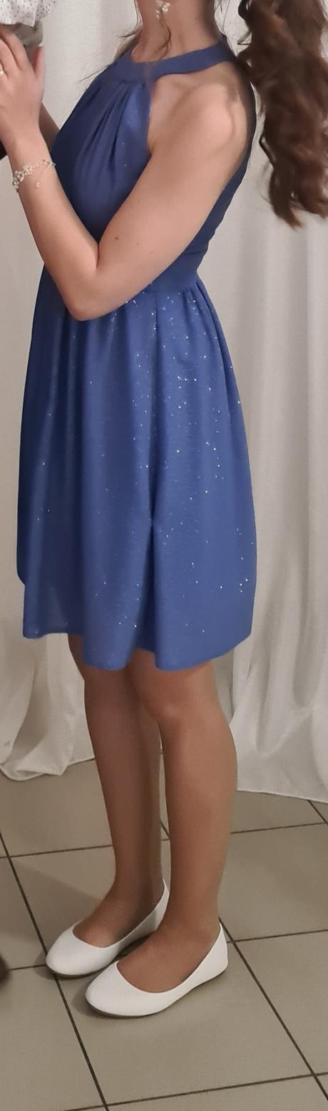 Kráľovský modre šaty, 36