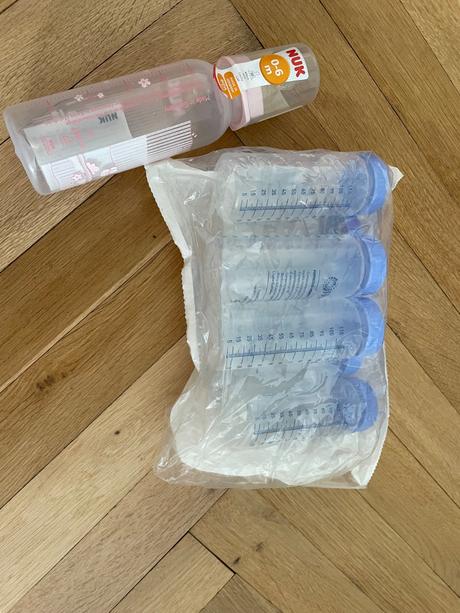 Darujem flasku a nadobky na mlieko, nuk