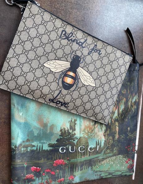 Original gg supreme blind for love wristlet pouch, gucci