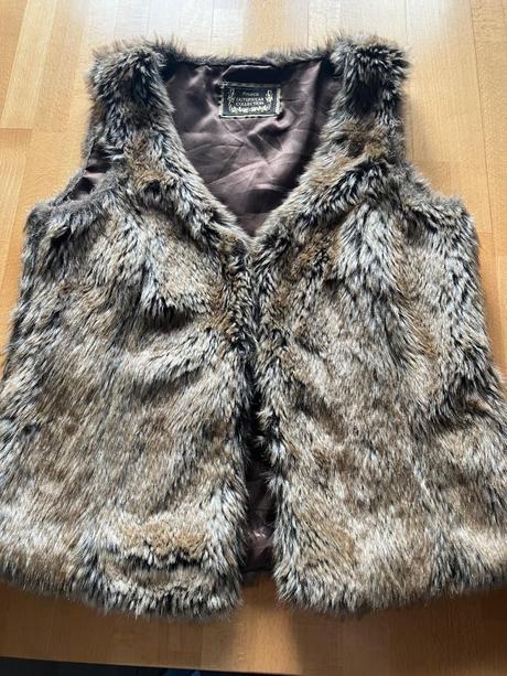 Dámska hrejivá vesta m/40-42, m