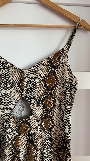 Zaujímavý overal, m