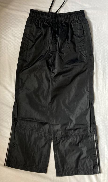 Crane nohavice do dažďa, 122