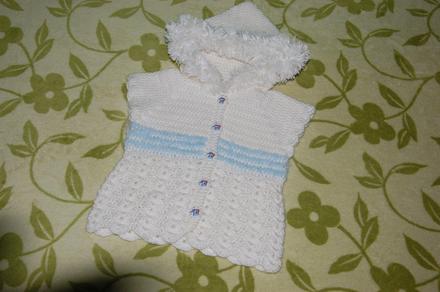 Vestička so sloníkovými gombíkmi, 92