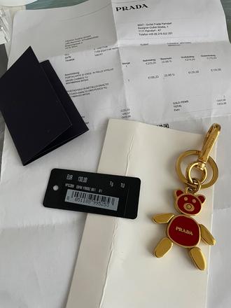 Prada prívesok s dokladom o kúpe, prada