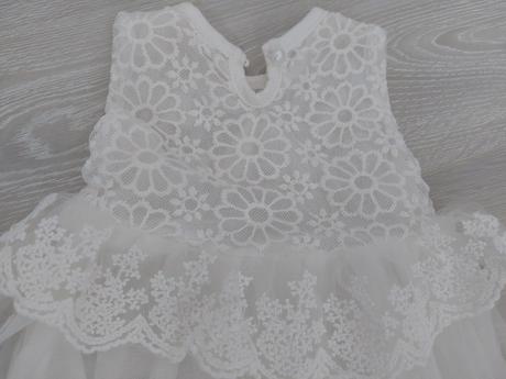 Biele sviatocne saty, 56