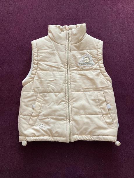 Krémová vesta, 128