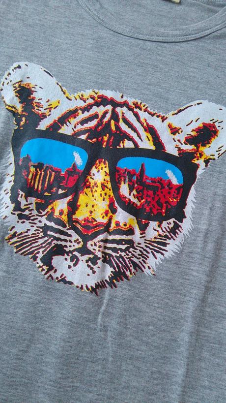 Tričko s tigrou hlavou a okuliarmi, 116