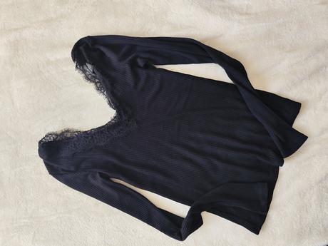 Balík oblečenia zeny, s