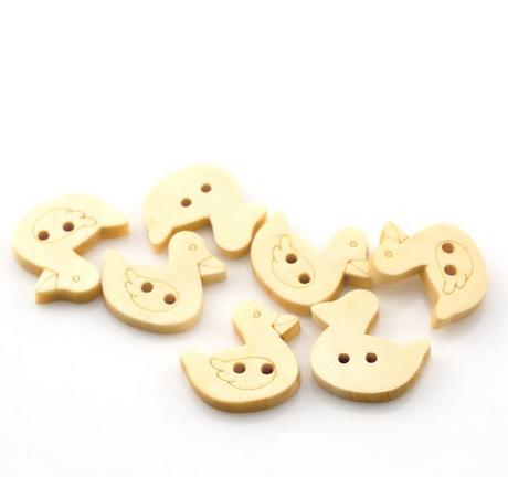 Drevený gombík kačička,