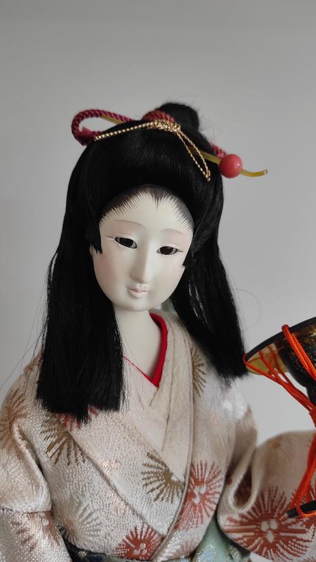 Japonská bábika s bubnom,