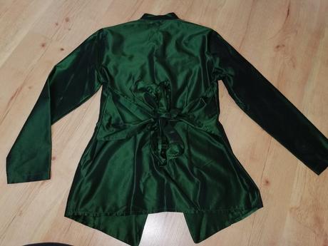 Smaragdové sako, 36