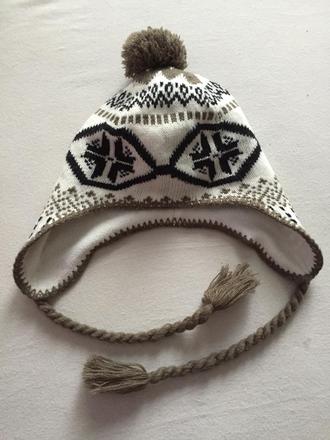 Čiapka s brmbolcom, 134