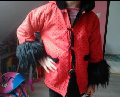 Dievčenský kabátik, 98