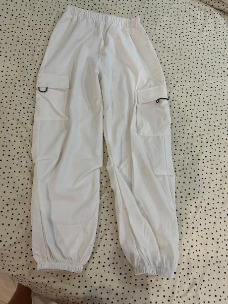 Biele širsie nohavice, 152