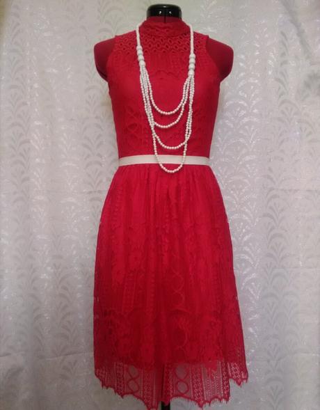 Červené šaty, 164