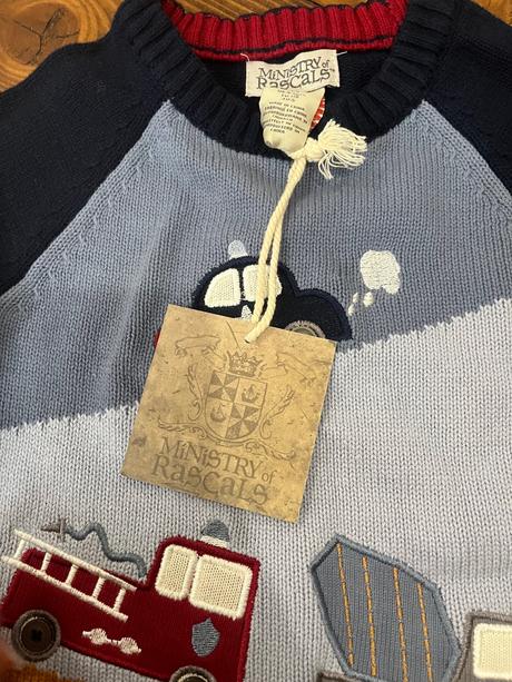 Svetrík s autami, 98