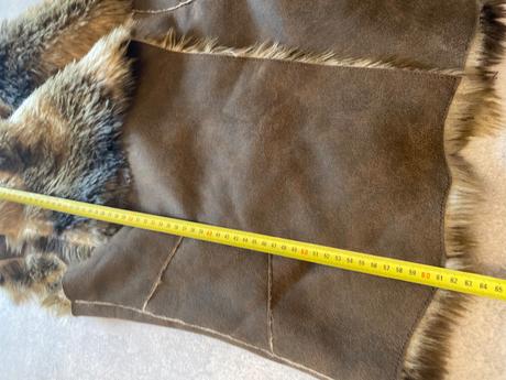 Kozusinova vesta per una, s