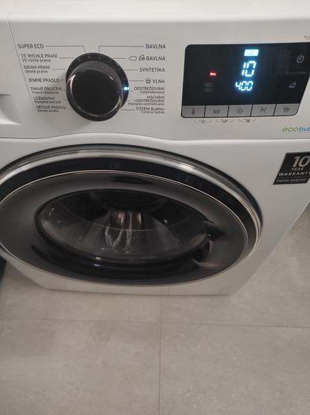 Pomoc s práčkou, v ktorej je bunda