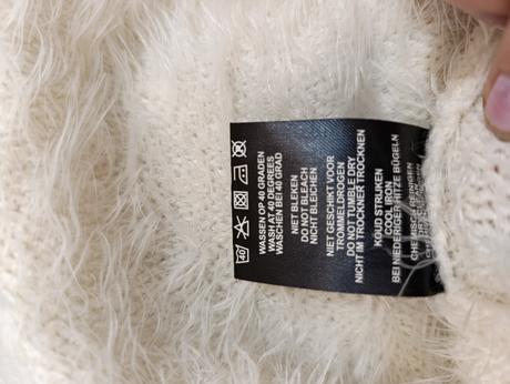 Vesta z obsahom peria, 42