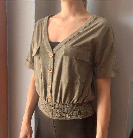 Khaki top, reserved,m