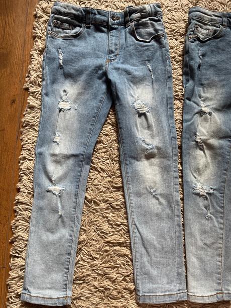 Rifle s ošúchaným vzhľadom a dierami, 122