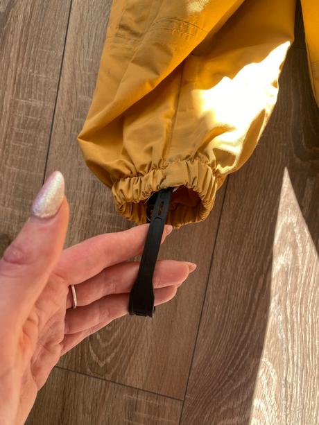 Kombinéza do dažďa, 92