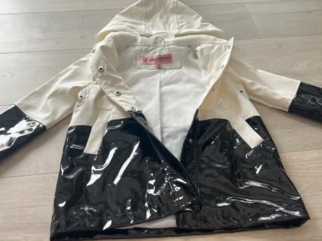 Prechodna protidazdova bundicka, 104