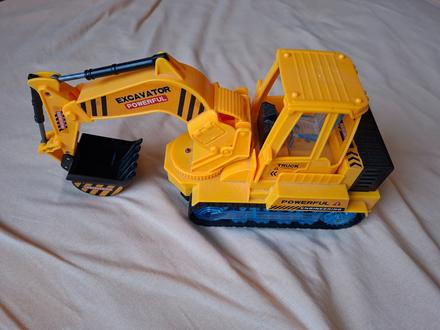 Buldozer hrajuci a svietiaci, 