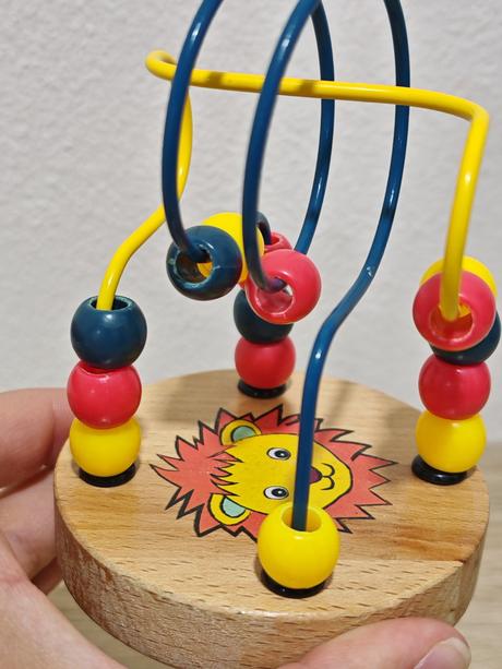 Drevená hračka hlavolam, 